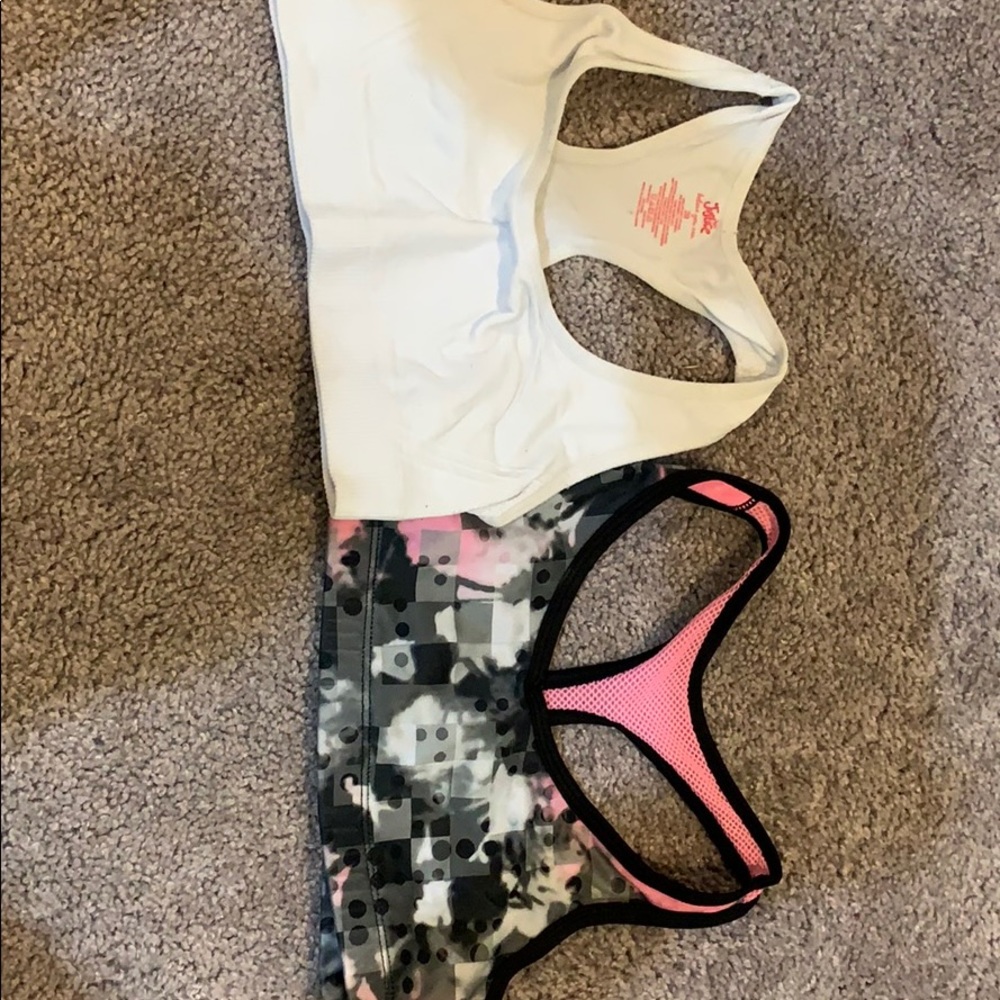 2 Justices sport bras.